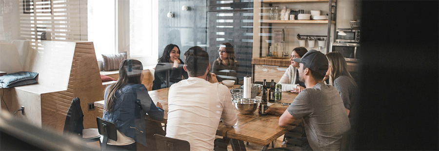 People collaborating around a work table